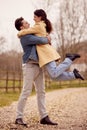 Loving Transgender Couple Enjoying Walk In Autumn Or Winter Countryside