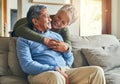 Loving you never gets old. an affectionate senior couple relaxing on a sofa together at home. Royalty Free Stock Photo