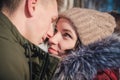 Loving young beautiful couple in the park on a bright sunny day. The girl looks into the eyes of her boyfriend and smiles Royalty Free Stock Photo