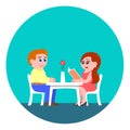 Loving young couple in a cafe at a table