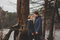 Loving young couple happy together outdoor on cozy warm walk in autumn forest Royalty Free Stock Photo