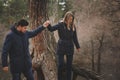 Loving young couple happy together outdoor on cozy warm walk in autumn forest Royalty Free Stock Photo