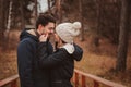 Loving young couple happy together outdoor on cozy warm walk in autumn forest Royalty Free Stock Photo