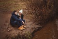 Loving young couple happy together outdoor on cozy warm walk in autumn forest Royalty Free Stock Photo