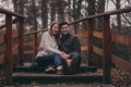 Loving young couple happy together outdoor on cozy warm walk in forest Royalty Free Stock Photo