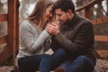 Loving young couple happy together outdoor on cozy warm walk in forest Royalty Free Stock Photo