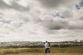 Loving young couple hugging and enjoying the time together outdoors. Love and tenderness, dating, romance