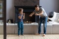 Young father and little son dancing at home Royalty Free Stock Photo