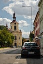 Lovosice, Czech republic - September 08, 2018: black car Opel Astra parked in Osvoboditelu street with Kostel Svateho Vaclava chur