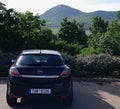 Lovosice, Czechia - May 24, 2023: view of Lovos hill from parking place in city