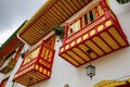 Low angel view of traditional colorful painted balconies, Salento, Colombia