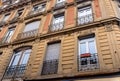 Low Angle Architectural Exterior View of Luxury Low Rise Residential Apartment Buildings in Urban City Environment with Balconies