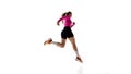 Low angle back view image of competitive female runner in motion, training, showing endurance isolated on white studio Royalty Free Stock Photo
