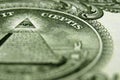 Back of the US dollar bill, focused on the eye above the pyramid. Royalty Free Stock Photo