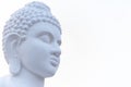 Low angle close up shot of Buddha statue face with copy space on right Royalty Free Stock Photo