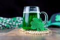 Low angle closeup of cold mug of green beer on St. Patricks Day Royalty Free Stock Photo