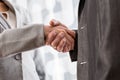 Low angle closeup view of a business handshake