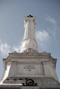 Low angle of the Column of Pedro IV in Rossio Square in Lisbon, Portugal