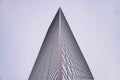 Low angle of the corner of Dentsu building at night in the Shiodome area of Minato, Tokyo, Japan