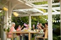 Family eating outside together in summer Royalty Free Stock Photo
