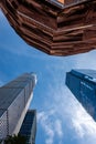 Low angle graphic view of skyscrapers and the Vessel building parts, sunny blue sky, New York City - Image