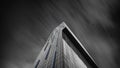 Low angle grayscale of the Beetham tower in Manchester against a long exposure of a sky