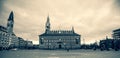 Low angle grayscale shot of the Copenhagen City Hall on cloudy sky background