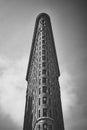 Low angle grayscale shot of the curious Flatiron Building in Manhattan, New York City, USA Royalty Free Stock Photo