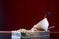 Low angle hamburger with beef burger cutlet, fried onion, ketchup sauce and french fries in traditional buns Royalty Free Stock Photo