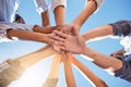 Low angle, hands and circle in success, solidarity or support team building, teamwork collaboration or diversity