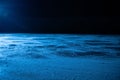 Low angle on ice surface in arena for figure skating or hockey. Ice background and ice texture is cut with pattern and Royalty Free Stock Photo