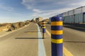 Road marker on sea-side road Woljeong Beach at Jeju Island. Royalty Free Stock Photo