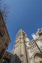 Low angle image of the tower of the cathedral of Toledo, Spain in a winter day with clear sky Royalty Free Stock Photo