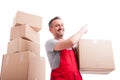 Low angle of mover man holding box pointing up Royalty Free Stock Photo