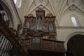 Low angle of an old vintage wooden musical organ of a church