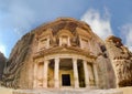 Low angle panoramic view of the facade of the Treasury building in the ancient Nabatean ruins Royalty Free Stock Photo