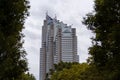 Low angle of the Park Hyatt Tokyo hotel in Shinjuku City, Tokyo Japan surrounded by trees