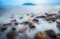 Low angle of pebble in surf Royalty Free Stock Photo