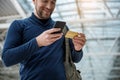 Content man purchasing airplane ticket Royalty Free Stock Photo