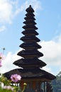 Low-angle Portrait View Of Balinese Ethnic Multi-tiered Meru Of Temple Building On The Shores Of Lake Beratan