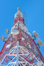 Low angle of a radio communication tower on a sunny morning Royalty Free Stock Photo