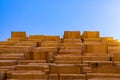 Wood planks stacked in sawmill yard