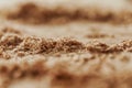 Low angle selective focus view of a pile of sawdust