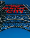 Low angle shoe of the sign of the Rotary Trail Birmingham Park (Magic City) under blue sky