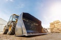 Low angle shoot of a small tractor or escavator. Industrial concept. Royalty Free Stock Photo