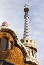 Low-angle shot of the abstract church dome at the Park Guell in Barcelona under the blue sky