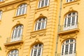 Low angle shot of an ancient yellow building with fancy exterior design in downtown Rio de Janeiro