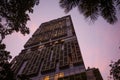 Low angle shot of the Antilia Ambani house in Mumbai at the purple sunset