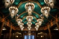 low angle shot of art deco chandeliers hanging from a high ceiling