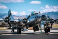 Low angle shot of a B-17 bomber plane from WWII captured on an airbase on a sunny day